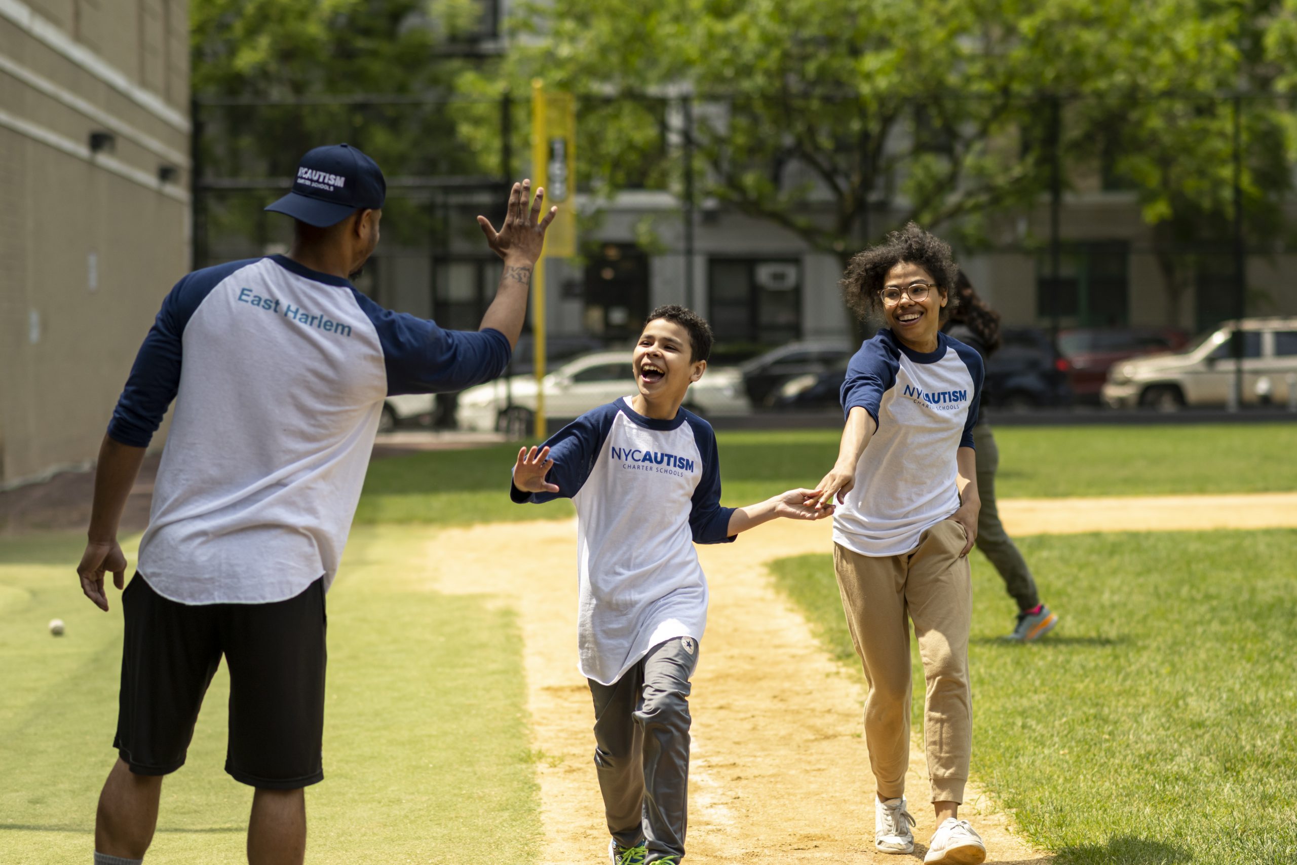 A student circles the bases at NYC Autism Charter Schools' All-Star Game.